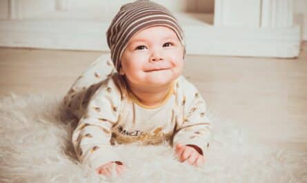 baby on fur rug