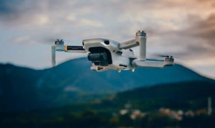 professional drone flying against mountains