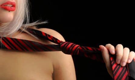 woman holding necktie