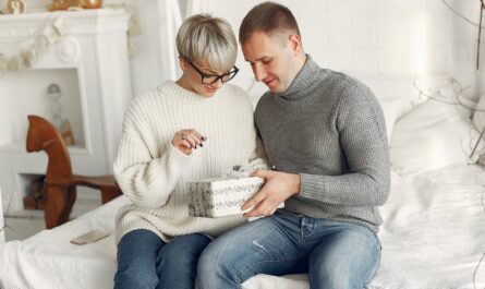 couple holding a christmas gift