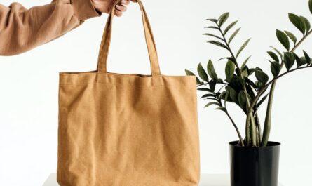 brown tote bag on white table