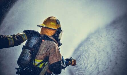 fireman holding fire hose