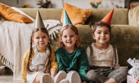 cute little girls sitting on the floor