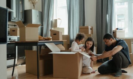 family unpacking after moving