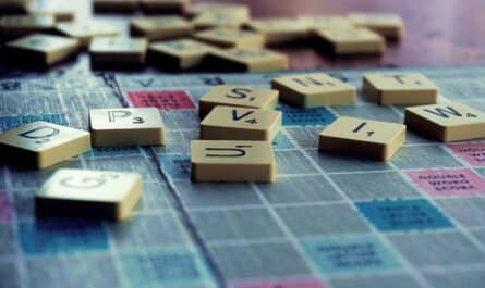 scrabble board game on shallow focus lens
